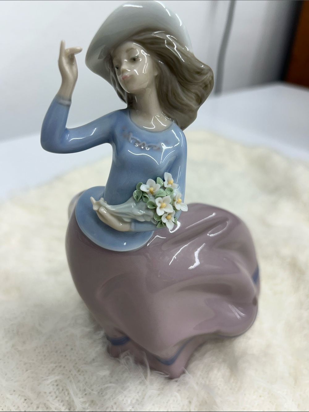 Lladro’ “Spring Breeze” #5590 -  Lady in Blue Top and Mauve Skirt with Bouquet